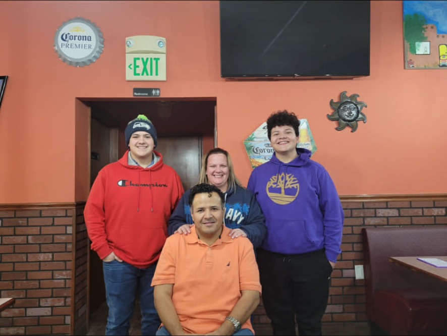 Alfredo and his family inside Cinco de Mayo in Lyons, Indiana